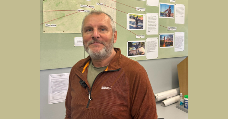Image of artist Ray Lonsdale smiling at camera.